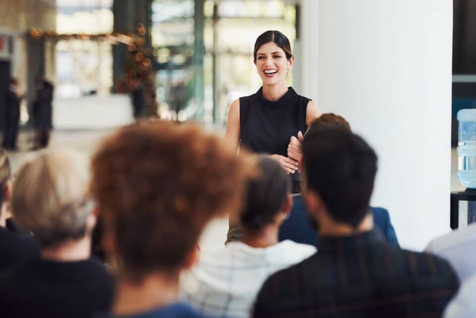 Shot of a young businesswoman delivering a speech.