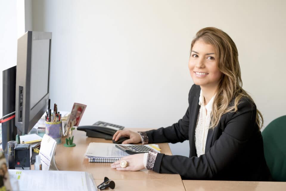 Young professional working at her desk